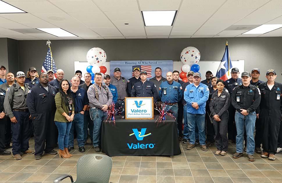 A group of Valero veterans stand together in the Port Arthur refinery