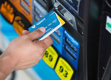 Customer with Valero card at gas pump