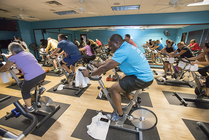 Valero employees enjoying spin class