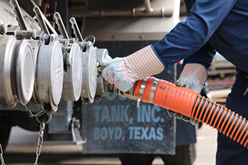 Tanker truck unloading fuel