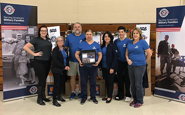 Group photo of Valero veterans with Operation Homefront members