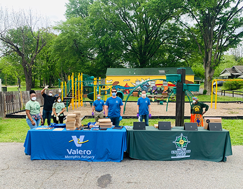 Valero volunteers donate laptops to community youth