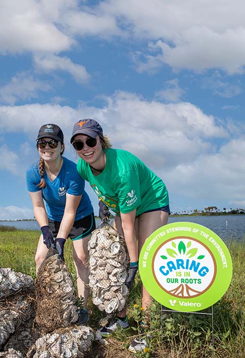 Valero employees volunteer at a cleanup event.