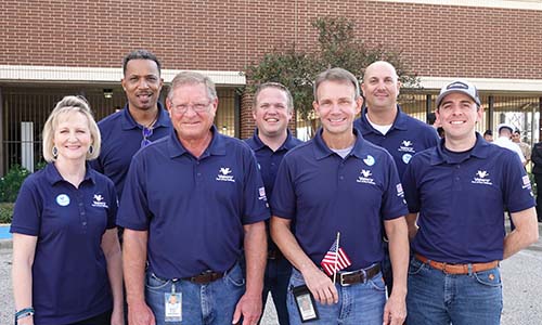 Valero veterans at the Port Arthur refinery stand together during Veterans Day 2022