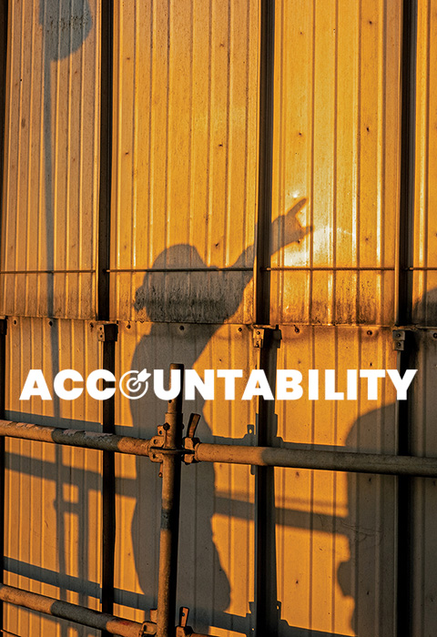 A silhouette of a Valero employee is case on a wall. Text reads: Accountability.