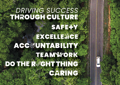 A white car drives through a forest. Text reads: "Driving success through culture. Safety. Excellence. Accountability. Teamwork. Do the right thing. Caring."