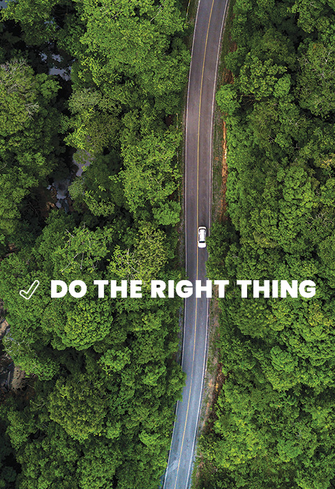From a bird's eye view, we see a car driving on a road in the woods. Text overlaid on the image reads: "Do the Right Thing."