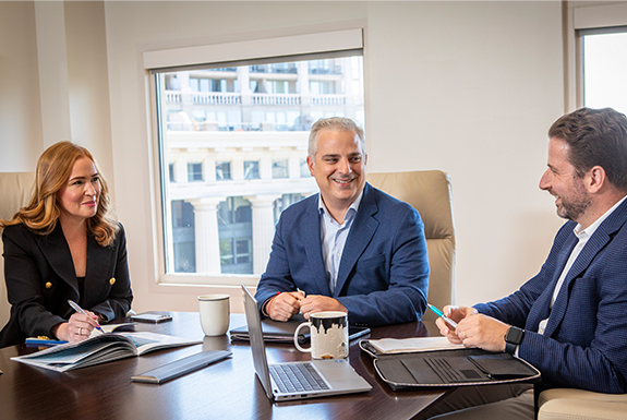 Valero employees sitting around a conference table.