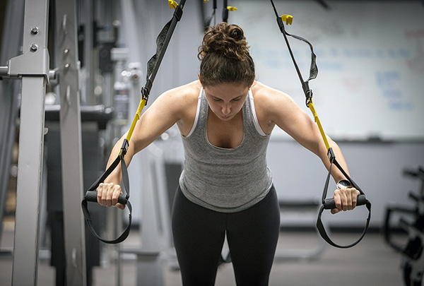 Girl exercising in gym
