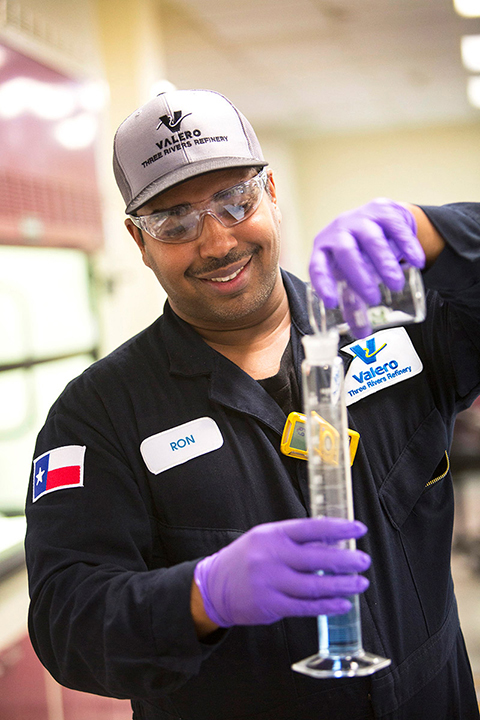 Valero refinery employee tests crude oil