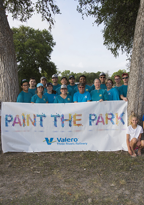 Valero Three Rivers volunteers paint the park