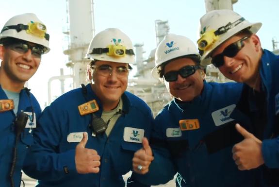 Smiling Refining Operators grouped together, thumbs up