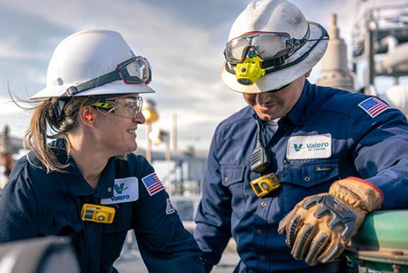 Two Valero employees work together at the St. Charles refinery.