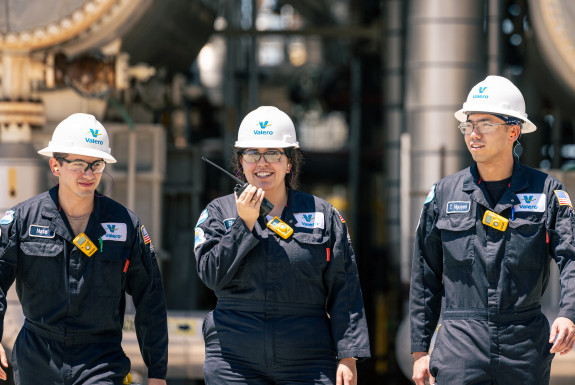 Valero employees walking in refinery