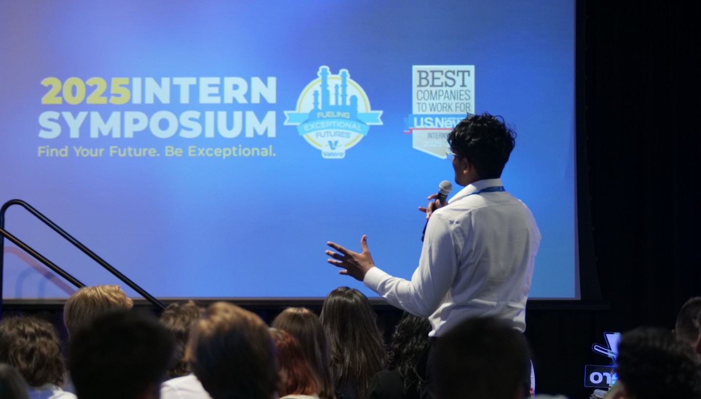 Symposium forum with student asking question