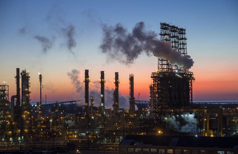 port arthur refinery at sunset