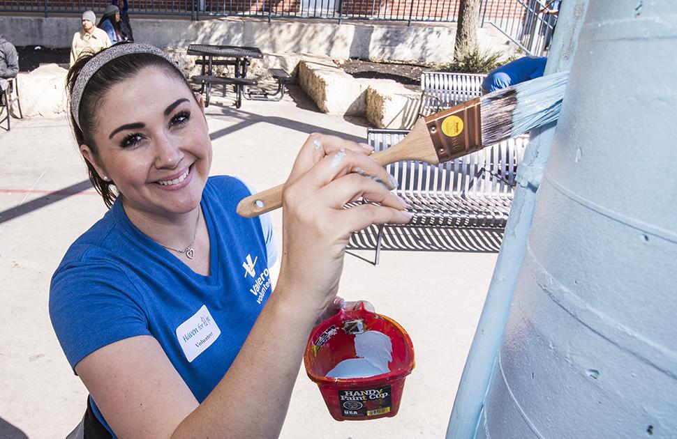 Valero volunteer helps paint homeless shelter in San Antonio