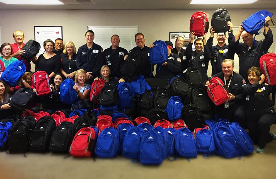 Valero employees donate backpacks and supplies to students