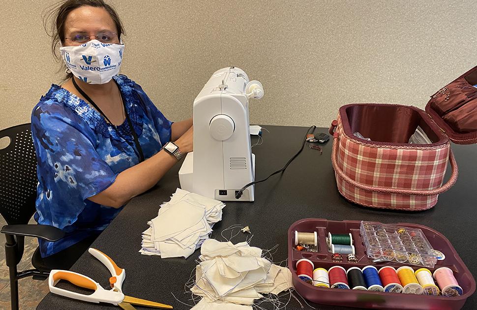 Valero volunteer makes face masks