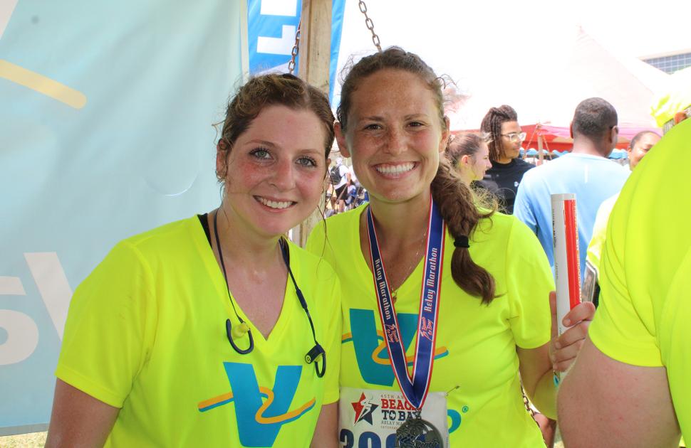 Valero Volunteers smile after a race