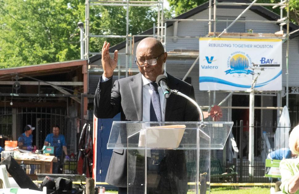 Rebuilding Together Houston event speaker talking to crowd