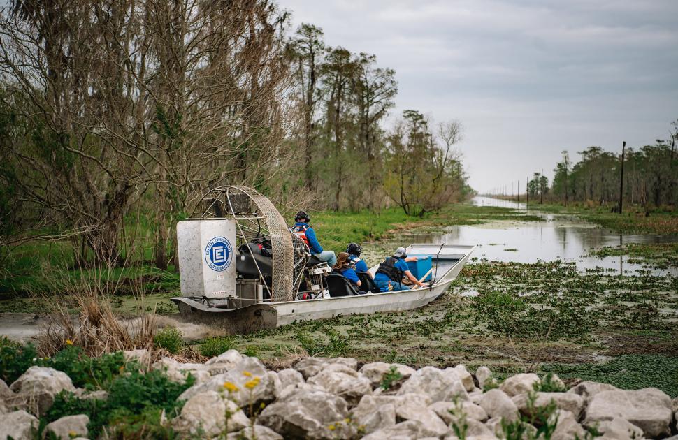 Valero Volunteers on a boat in the swamp