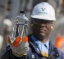 Valero employee inspecting fuel product