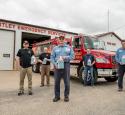 Valero Hartley volunteers donate hand sanitizer to first responders