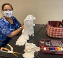 Valero volunteer makes face masks