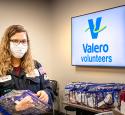 Valero volunteer assembles hygiene kits