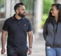 Employees walking and talking at corporate headquarters