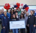 Veterans at Valero's Wilmington refinery pose with a check donation of $45,000 to U.S. Vets - Long Beach.