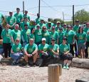 Refinery volunteers gathered at a playground during an outreach event