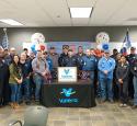 A group of Valero veterans stand together in the Port Arthur refinery