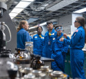Students on tour inside refinery lab