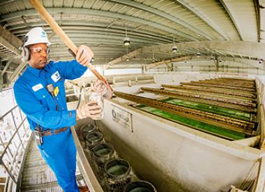 Valero employee testing wastewater