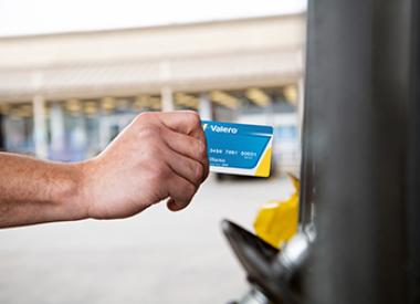 Customer using Valero credit card at pump
