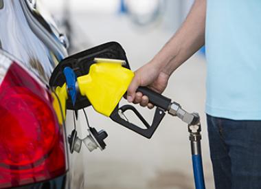 Customer pumping gas