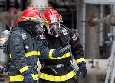 Two Valero Refinery Firemen doing a safety check