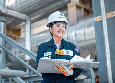 Woman holding a clipboard