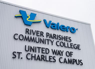 Building sign reads Valero, River Parishes Community College, United Way of St. Charles Campus