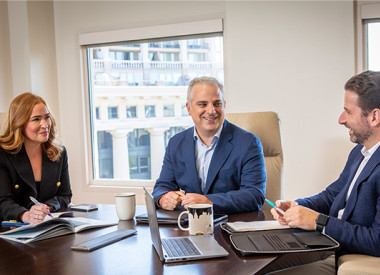 Valero employees sitting around a conference table.