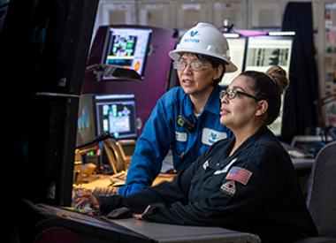 Two female Valero refinery employees