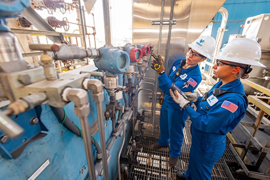 Two female Valero refinery employees